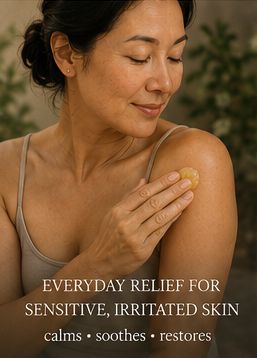 A woman with her eyes closed applies a small yellow cosmetic or skincare product to her upper arm. Text at the bottom reads, 'EVERYDAY RELIEF FOR SENSITIVE, IRRITATED SKIN' and 'calms sooths restores'.